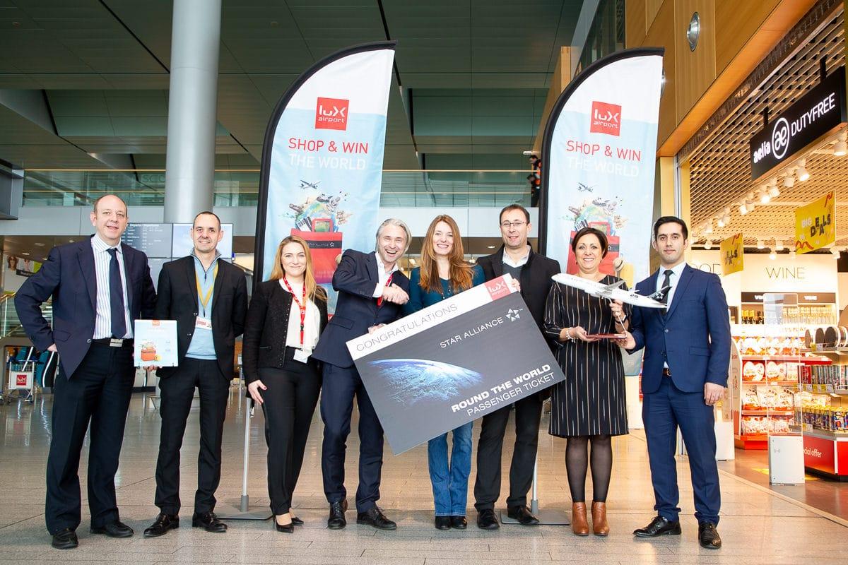 Picture (From Left To Right) : Olivier Francois (Aelia Duty Free Shops), Olivier Valentin (Ssp Luxembourg), Rebecca Pecnik-Welsch (Lux-Airport), René Steinhaus (Ceo Lux-Airport), Mario Z. And Tatjana M. ( Winner), Evelyse Renassia (Lufthansa Group), Ibrahim Dündaran  (Turkish Airlines)